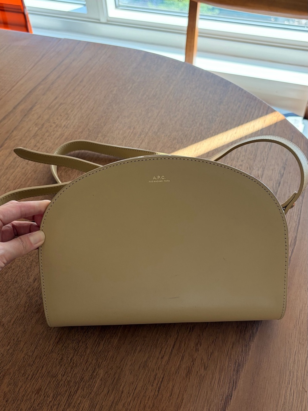 A.P.C. Half Moon Crossbody Bag in butter yellow